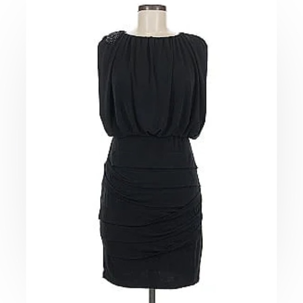 Little black dress with shoulder detail, size 6